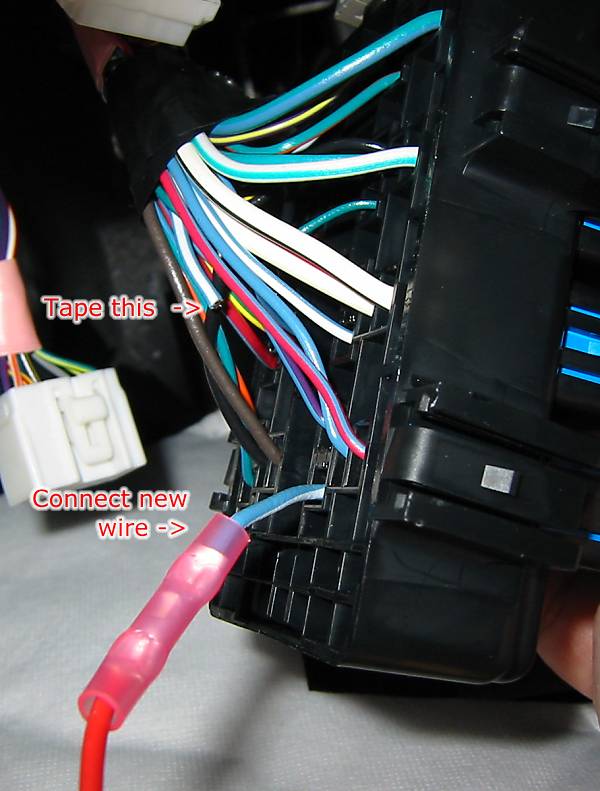 Cut blue/white wire, connect new wire as shown